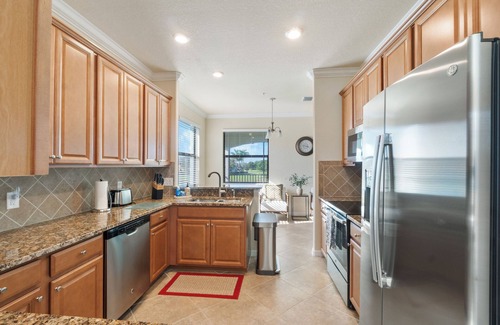 Naples House | Top-Floor Luxury Coach Home with Lake Views & Resort Amenities – Treviso Bay