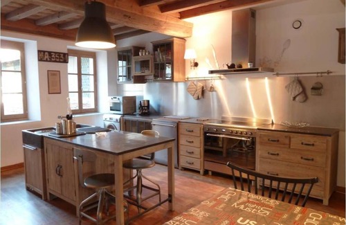 Tournus House | Town house at the foot of the abbey restored in a loft spirit with garden!