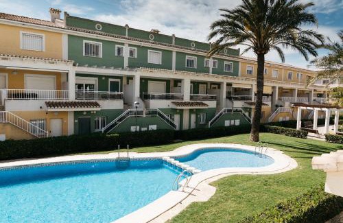 Playa de Gandia Villa | Townhouse with terraces and communal pool