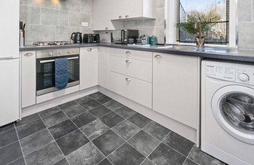 Coatbridge Apartment | Traditional ground floor apartment with main door entrance.