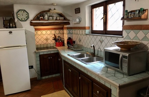 Girasole Apartment | Traditional Sardinian semi-basement tavern - 5 min from the sea in Ogliastra