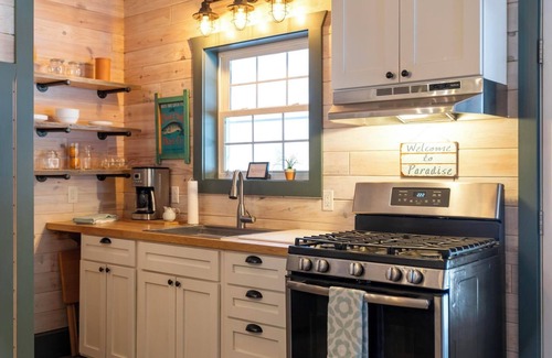 Levering Cabin | Tranquil Retreat Nestled Among the Trees – Access to Waterfront!
