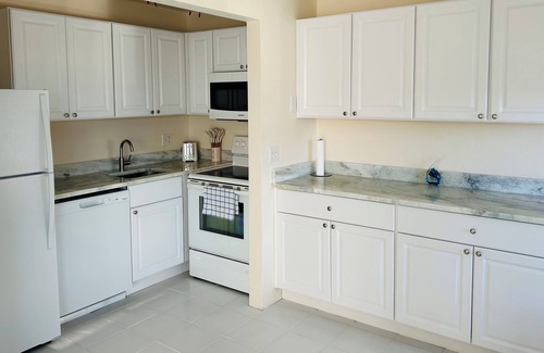 Shell Harbor Condo | Tranquil WATERFRONT 2-bedroom condo on Sanibel Island minutes to the beach!