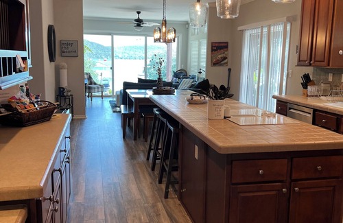 Graham House | Tranquil Waterfront property with a pool, hot tub, fire-pit & large patio.