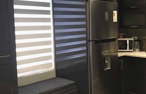 Newtown Apartment | Tranquility Hotel Suite RC, walking distance to the QPS, Ariapita Ave, & EV Zoo,