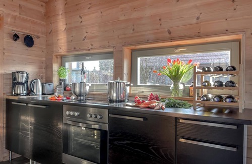 Vogelsang-Warsin House | traumHaff® Cozy coastal chalet made entirely of larch wood with fireplace & sauna Baltic Sea