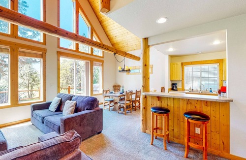 Klamath Falls House | Tree-lined cabin with large deck, pool, hot tub, & fireplace - dog-friendly