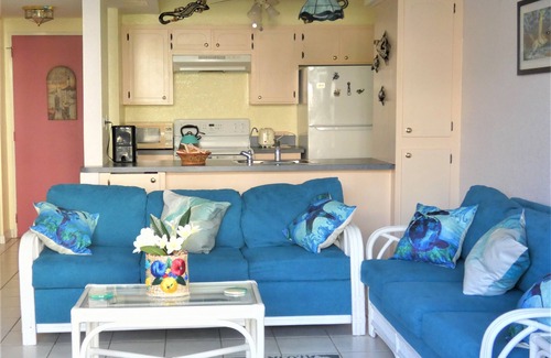 Williams Town Condo | Tropical Oasis: Ocean View ~ Pool & Bar ~ Family-Friendly
