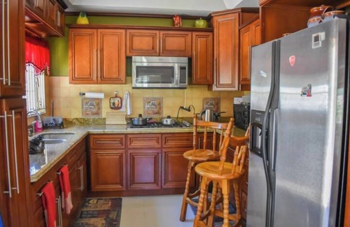 Mandeville House | Tropical Treasure: 4 BR Oasis in the Hills of JA