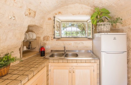 San Michele Salentino Villa | Trullo Il Pioppo Gigante. Jacuzzi, Private garden, Sandy beaches at 15 km.