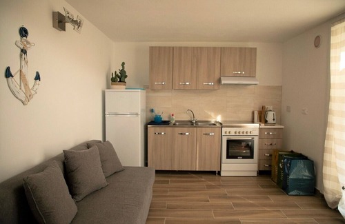 Marinella di Sarzana Apartment | Two-room apartment on the attic floor overlooking the Apuan Alps and the surrounding pine forest