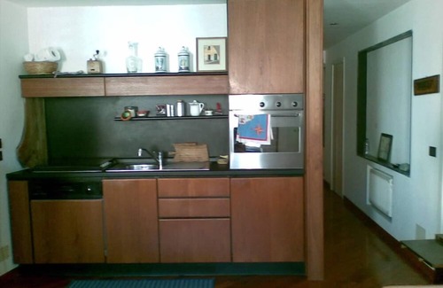 Camogli Apartment | Two windows of the fishing harbor