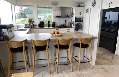 Waimarama House | Ultimate Beachfront - Family Friendly with games room and multiple decks