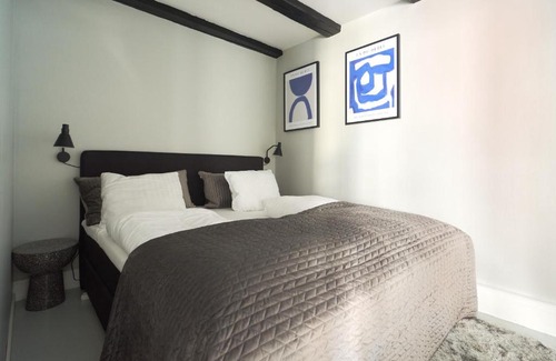 Indre By Apartment | Unique 2 Bedroom Duplex w Exposed Beams in CPH City