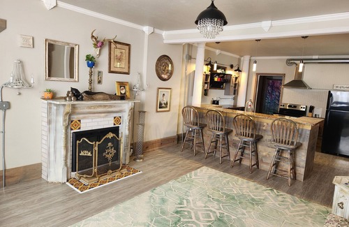 Lansing House | Unwind at the Lotus house Opal suite.