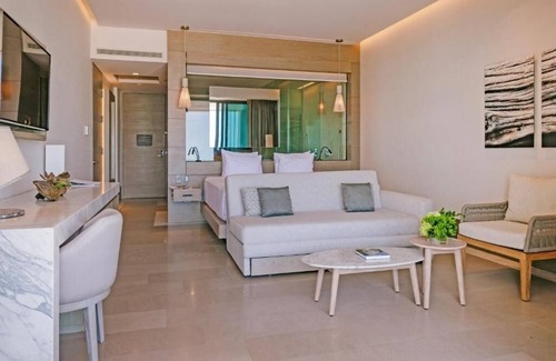 Punta Sam Hotel | Unwind in Style: Beachfront Resort w/Tranquil Pools, Spa & Delicious Cuisine