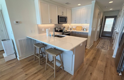 Fort Bay Condo | Updated Latitude 29 #34 Beachfront w/Pool, Hot Tub & Grills! Free Golf & Tix!