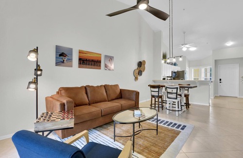 Ole Condo | Updated modern 3rd floor Lely Resort condo overlooking tropical preserve!