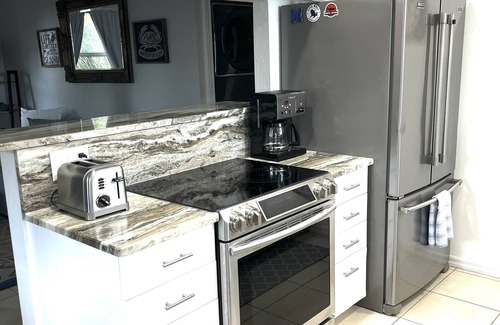 North Captiva House | Upgraded beach house located just steps away from the beach. Pool and Hot tub.