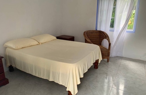 Fairy Hill House | Upstairs Room with Terrace at RobinHood guesthouse