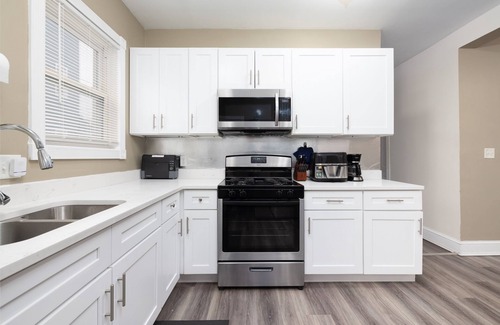 Hartford House | Urban 2-Story Remodeled Townhouse Retreat