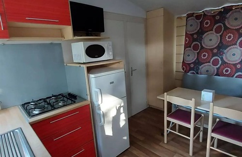 Bizanet House | Ushuaïa Villages Camping Figurotta * - Mobile home La Garigue 23m² - 2 bedrooms + Air conditioning + TV + Covered terrace 4 people