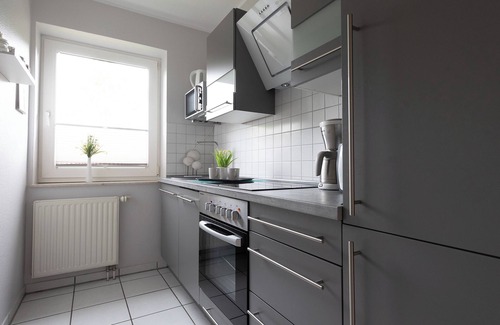 Wremen Apartment | Vacation apartment Nordseebrise. Inviting and with balcony.