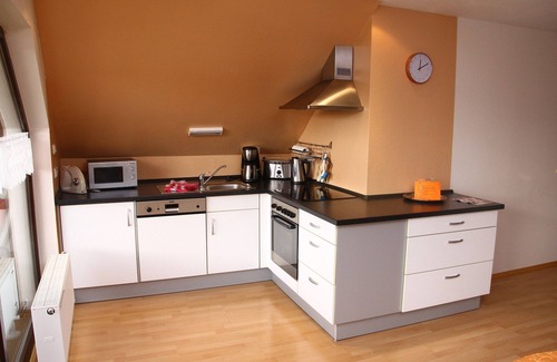 Grossheubach Apartment | Vacation apartment "Engelbergblick" with large panoramic window and balcony| 4 stars
