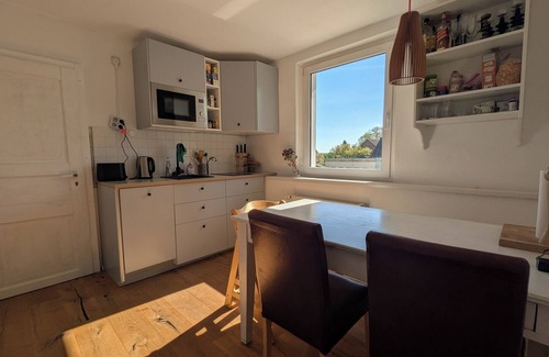 Carpin Apartment | Vacation apartment in a cozy farmhouse by the bathing lake with large garden and sauna