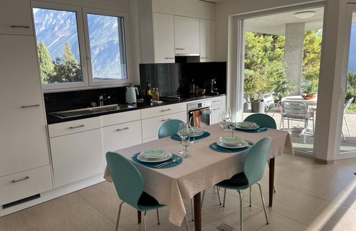Venthone Apartment | Vacation apartment - View of mountains & town/near Crans-Montana