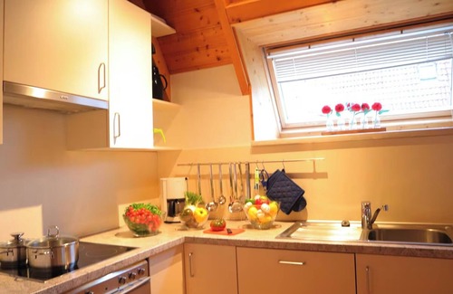 Dorumer Neufeld House | Vacation home "MoinMoin" - Experience maritime charm on the Wurster North Sea coast!