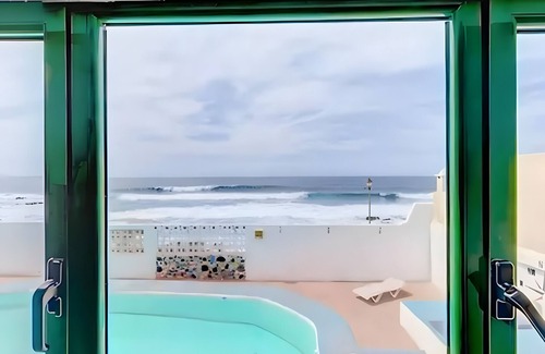 La Santa House | Vacation Home 'La Santa' with Sea View, Shared Pool and Wi-Fi