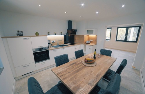 Guestrow House | Vacation home on the Inselsee, with private lake access, jetty and bathing facilities