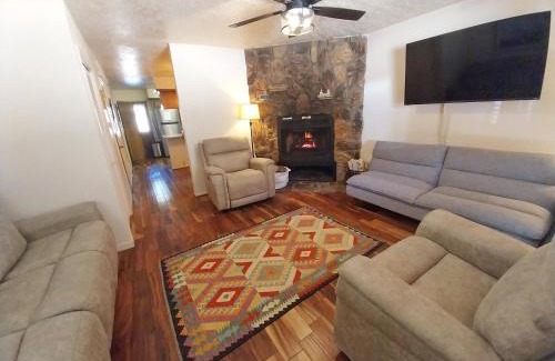 Red River House | Valley Condo 117 - Creekside - WiFi - Hot Tub - Fireplace - Washer - Dryer - Playground