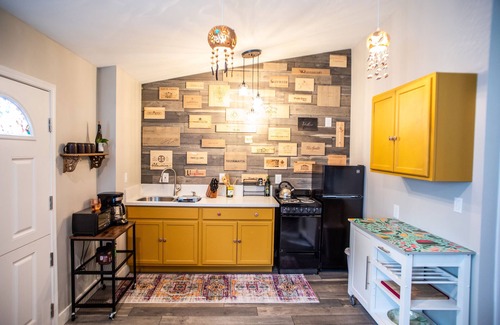 Lakeside Apartment | Vibrant Bohemian Loft Apartment with Shared Pool, Garden & Colorful Murals