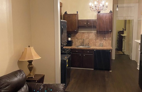 West Riverside House | Victorian Historic Uptown One Bedroom on Parade Route with Queen Sofa Couch