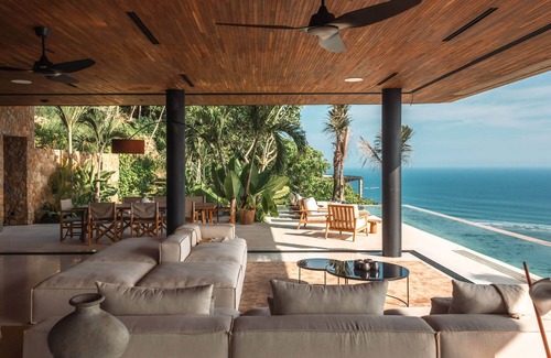 Praya Barat Villa | Villa Awasi - 3 Bedroom - 1 TV room with sofa bed at Tampah Hills