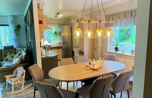Vidsel House | Villa Davvi dállu: Family-friendly vacation home with playhouse, sauna & garden
