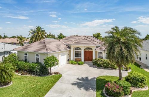 Caloosahatchee Villa | Villa-Haze, lots of privacy, solar & electric heated pool and SPA