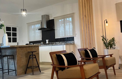 Monte Cristi House | Villa Nola provides natural sun light through the entire 2 bedroom stylish home.