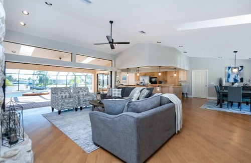Punta Gorda House | Villa Tropical | Waterfront Luxury in Punta Gorda Heated Pool Spa Dock