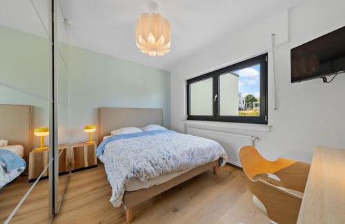 Roeser Apartment | Villa66 Private bedroom 5 - Shared Kitchen