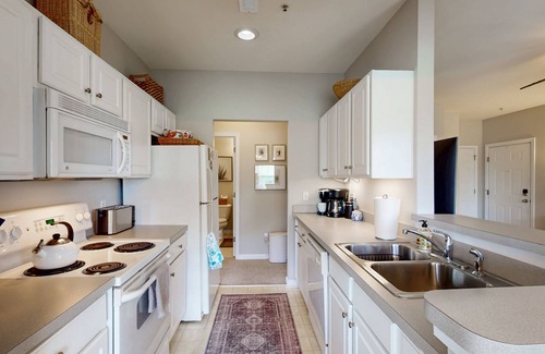 Rehoboth Beach Condo | Villas at Bay Crossing pet friendly condo w/shared pool, balcony