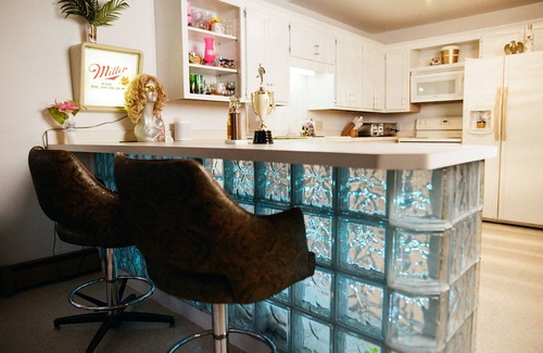 Stanchfield House | Vintage kitsch 70s/80s themed house with indoor pool and backyard creek
