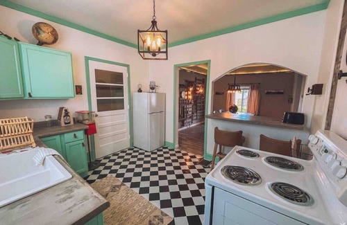 Dowagiac Cottage | Vintage Romance Finds Cozy Charm at Depot Cottage