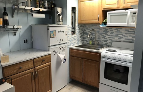 Maple City Condo | Walk-out Studio Condo On The Beach In The Homestead Resort. Newly remodeled!