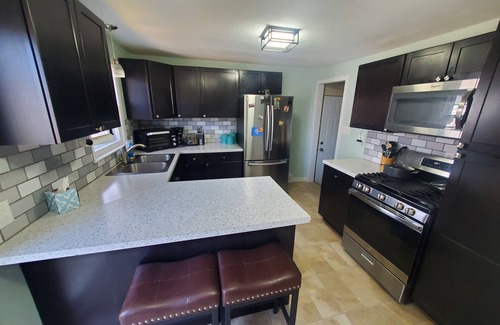 Green Bay House | Walk to Lambeau! Spacious home with fenced in yard