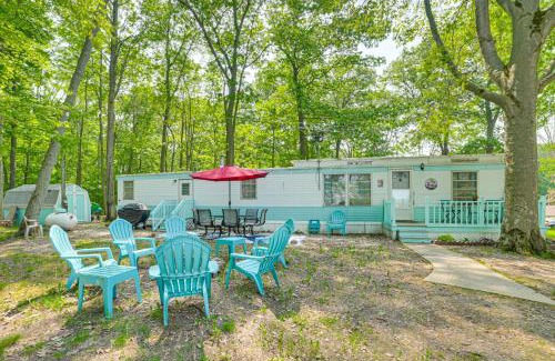 Kalkaska House | Walk to Manistee Lake Retro Cottage with Fire Pit!
