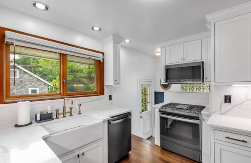 Birmingham House | Walk to shopping, Charming Modern European cottage with huge deck