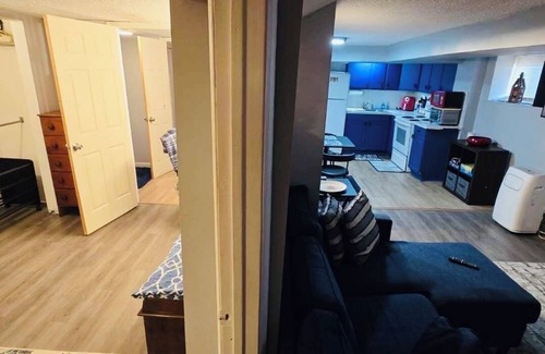 Troy House | Warm and cozy basement.